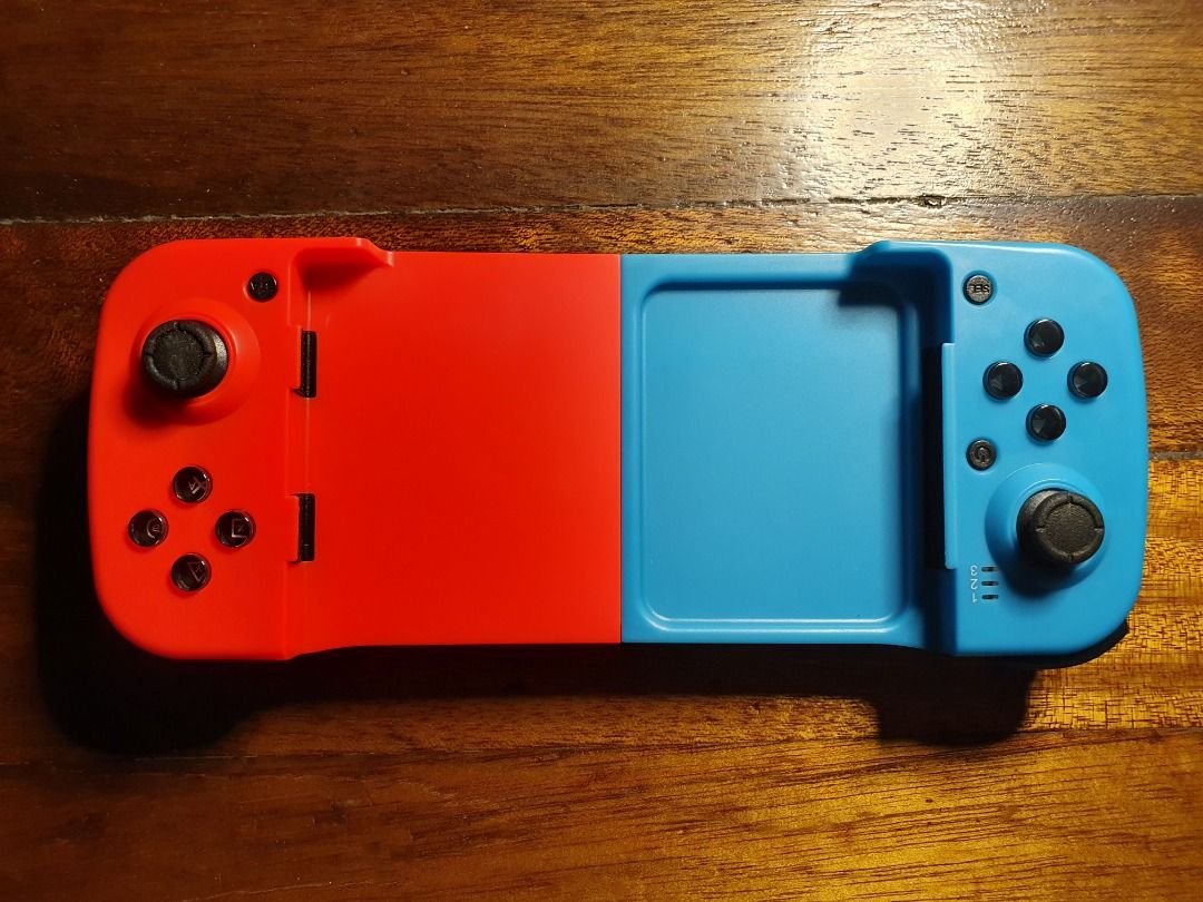 Nintendo Switch (Bluetooth Mobile Game Controller) (Category: Controllers) located in Manila. Submitted by ginrei (Listing ID 1259230486, Image 2). Description: Nintendo Switch (Bluetooth) Mobile Game Controller Gaming Accessory Condition: Unused / Brand New Inclusions: - 1x Game Controller - 1x Micro USB Cable - 1x Manual Box is damaged from shipping. GAME CONTROLLER ONLY THIS IS NOT A SWITCH DM if interested PAYMENT FIRST POLICY NO JOY RESERVAT