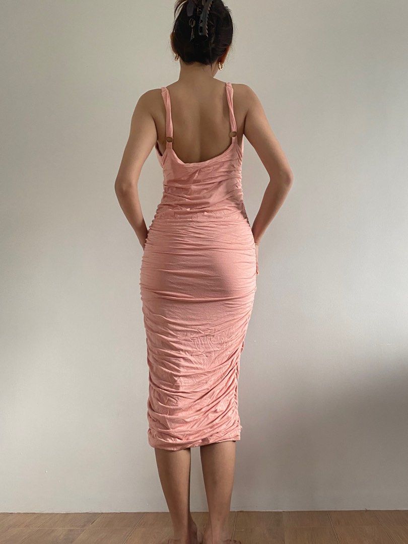 Pink Bodycon Dress (Category: Evening dresses & gowns) located in Quezon City. Submitted by seawears.ph (Listing ID 1259226350, Image 2). Description: Size: Medium- Large ( XL on tag) Brand: Oh polly Condition: 10/10 • with adjustable straps • no issues • stretchable MEASUREMENT (when laid flat) Bust: 16 inches Length: 40 inches .