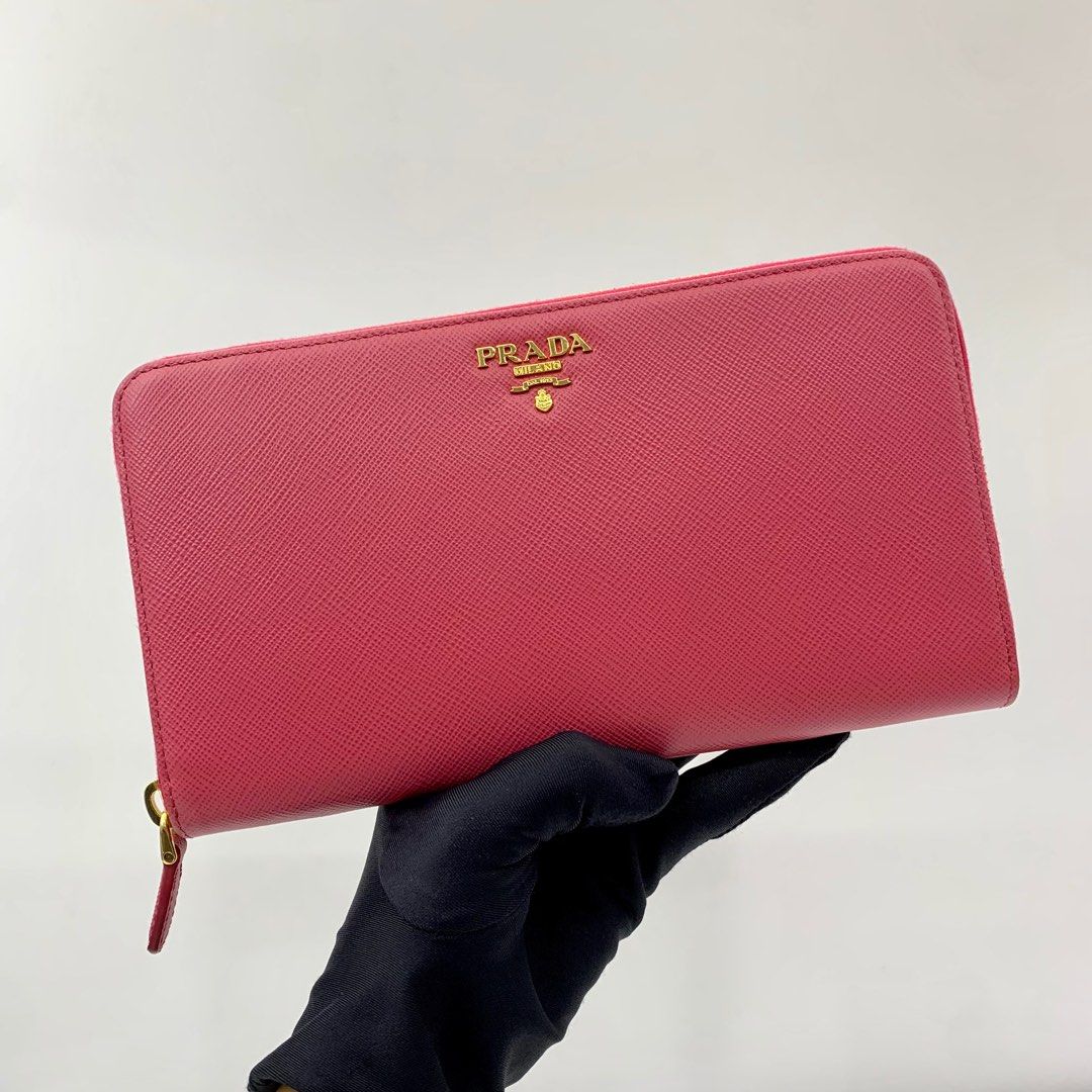 Authentic prada zippy wallet, Luxury, Bags & Wallets on Carousell