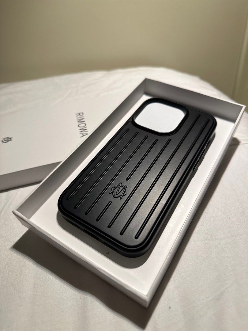 Rimowa iphone 14 pro case (authentic) (Category: Cases & Sleeves) located in Pasig City. Submitted by ecrz19 (Listing ID 1259246973, Image 2). Description: Rimowa iphone case Guaranteed authentic with warranty brand new with receipt Bought in Barcelona, Spain on Oct 3, 2023 On hand: Iphone 14 pro black -10k Iphone 14 pro aluminum - 12k SOLD Iphone 15 pro aluminum - 12k SOLD.