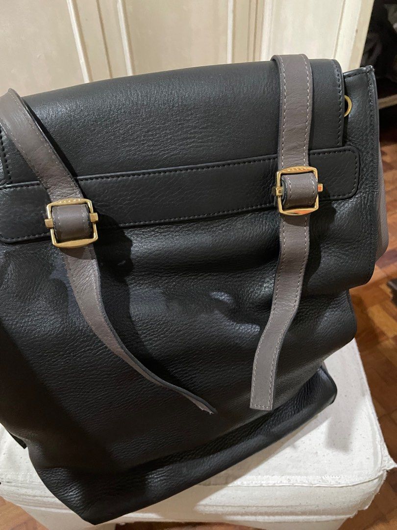 Sling bag/shoulder bag (Category: Luxury Bags & Wallets) located in Quezon City. Submitted by deadmit (Listing ID 1259262524, Image 3). Description: Leather Still in very good condition except for the strings on the side… Size 16”x 12” Taupe with black. Very spacious and beautiful leather.