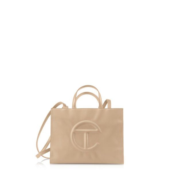 Telfar Medium Tote (Category: Luxury Bags & Wallets) located in Taguig. Submitted by sourcedbym (Listing ID 1259198986, Image 3). Description: Comes with dust bag. Condition: 9.5 Dimensions: Height 11 1/4”, Width 15”, Depth 5”, Strap Drop 21”, Handle Drop 5 1/2” Free shipping within mma. .