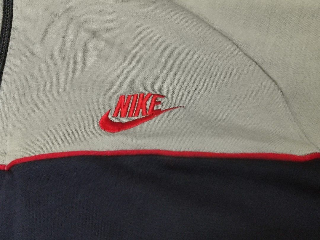 Nike red on sale tag trainers