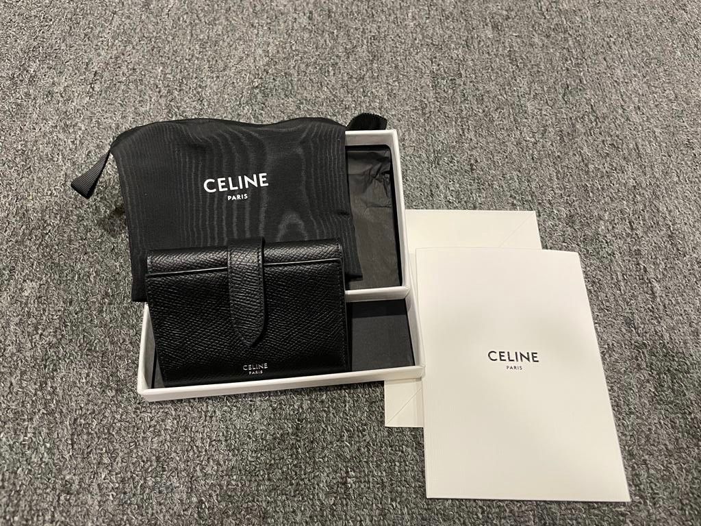 Shop CELINE Strap 2021-22FW Fine strap wallet in grained calfskin  (10H483BEL.38SI) by SaturdayCloset