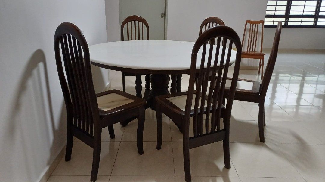 Dining Table Set (Category: Tables & Sets) located in Singapore. Submitted by rmemo (Listing ID 1263359644, Image 1). Description: Mable top dinning table set with 5 chairs Table dimension Diameter 150cm Height 75cm Self collection.