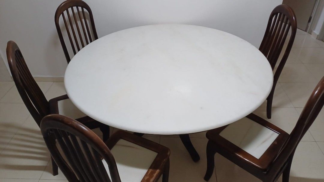 Dining Table Set (Category: Tables & Sets) located in Singapore. Submitted by rmemo (Listing ID 1263359644, Image 2). Description: Mable top dinning table set with 5 chairs Table dimension Diameter 150cm Height 75cm Self collection.