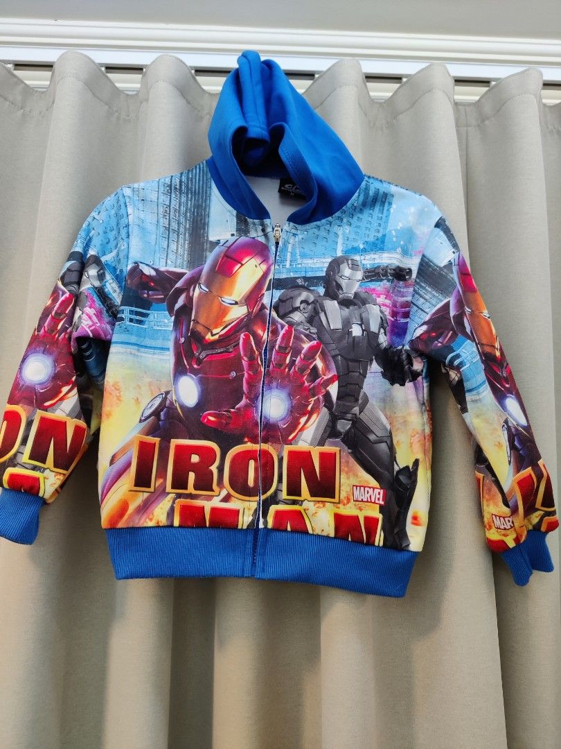 Iron Man Zippered Hoodie Jacket (Category: Babies & Kids Fashion) located in Quezon City. Submitted by agstan_boutique (Listing ID 1263281907, Image 1). Description: It was a gift for my son but it was quite small for him so he was able to used it only once. With 2 side pockets Size medium. Please see photos for the measurements.