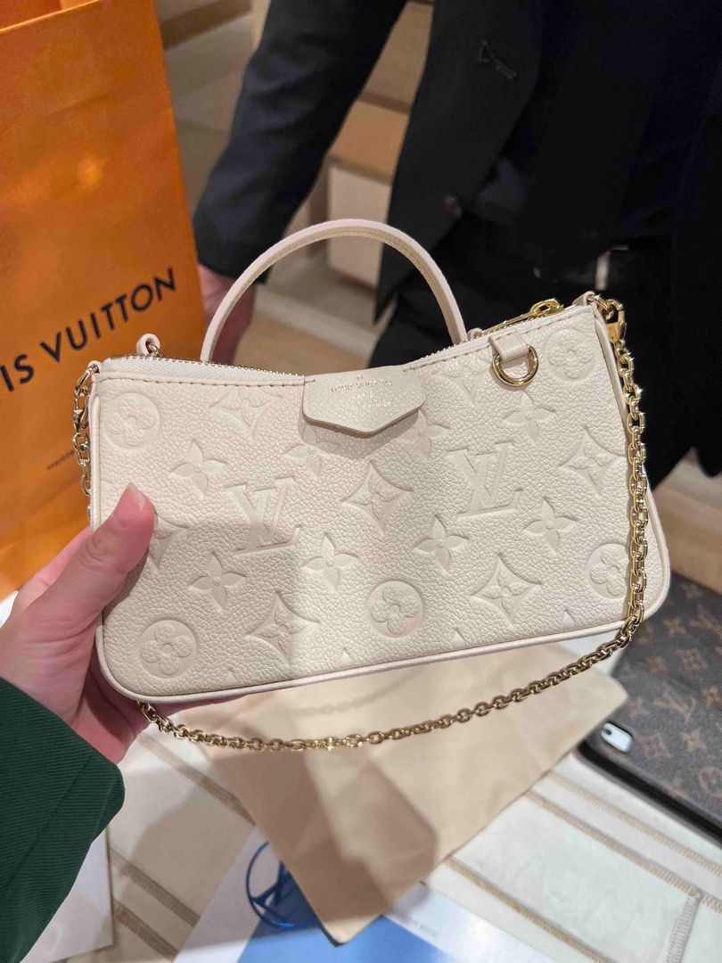 Louis Vuitton Easy Pouch On Strap in Crème, Luxury, Bags & Wallets on  Carousell