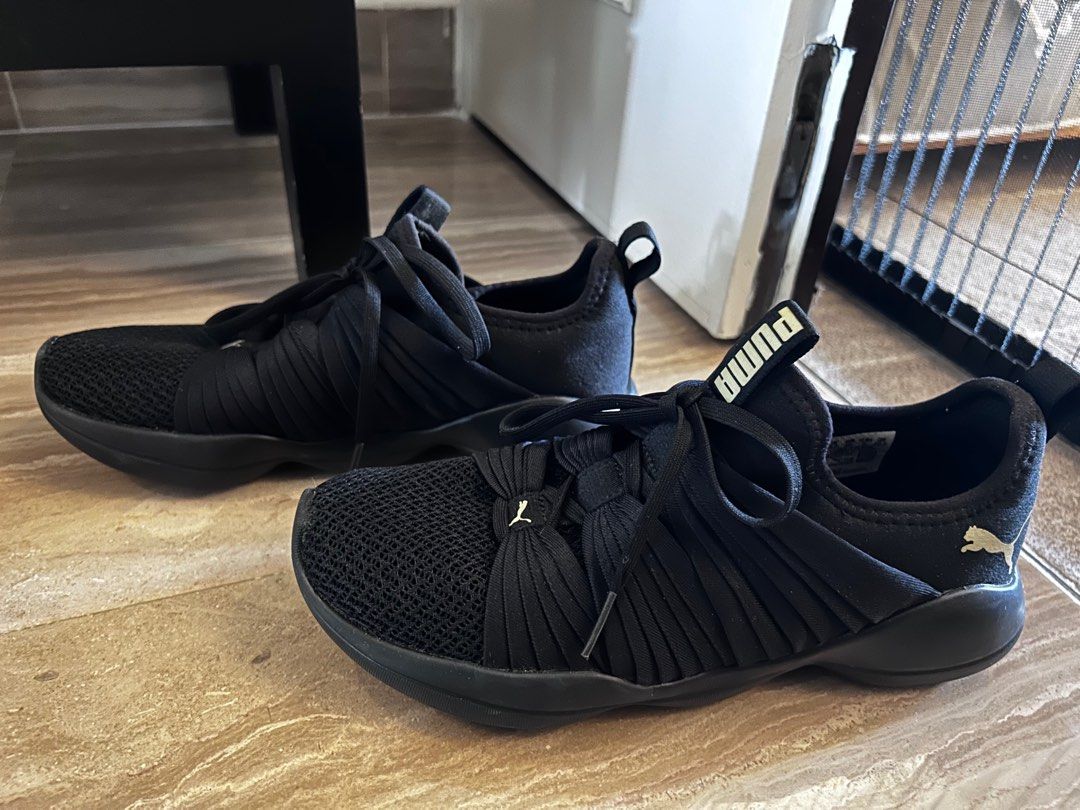 Puma sales flourish black