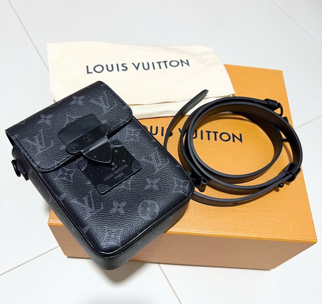 LOUIS VUITTON S LOCK VERTICAL WEARABLE WALLET, Luxury, Bags & Wallets on  Carousell