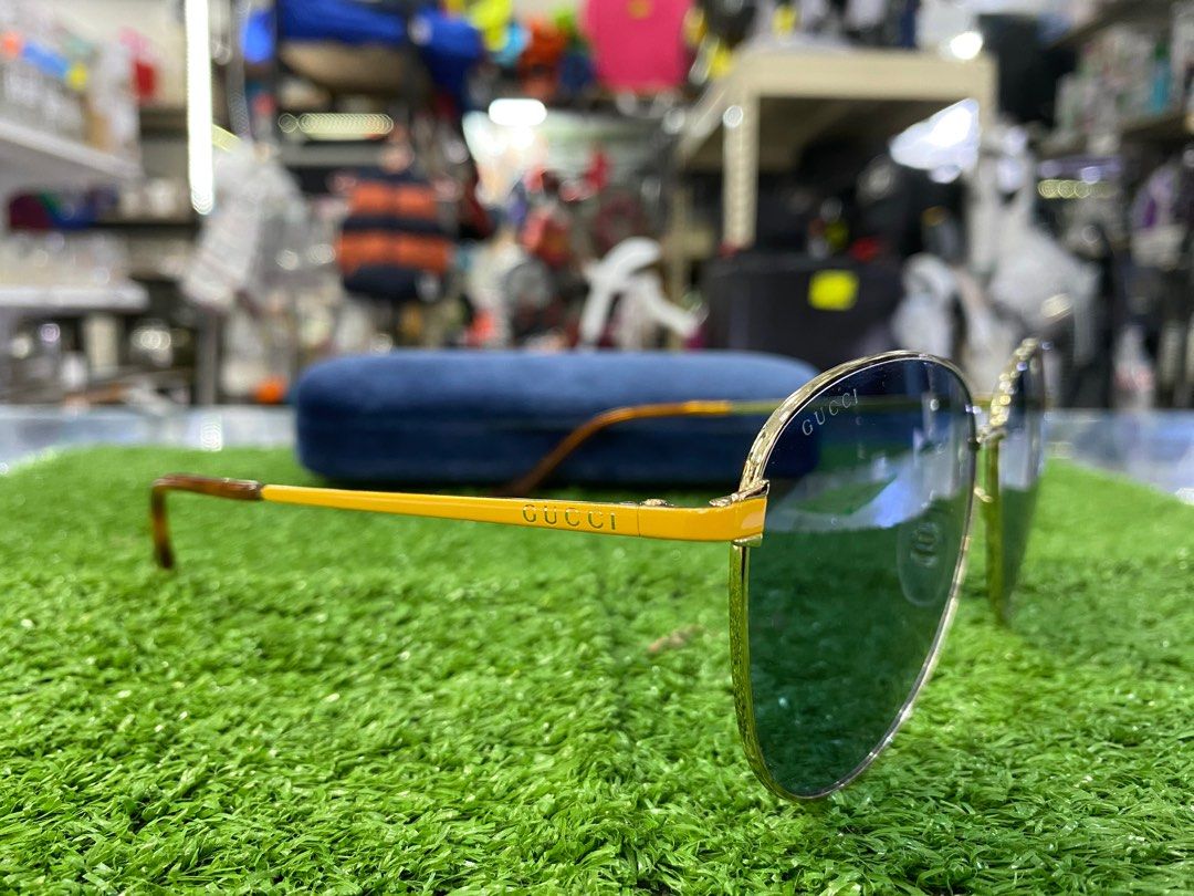 Gucci sunglasses green lens outlet