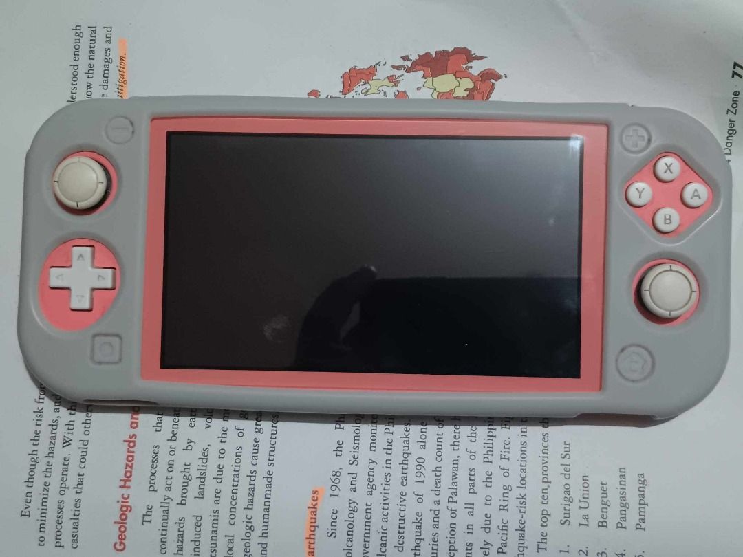 Nintendo Switch Lite (Category: Nintendo) located in Manila. Submitted by g472482173 (Listing ID 1264877493, Image 2). Description: Lightly used Nintendo Switch, Orgianl Price: 9000, Includes Charger and Orginal Box Note: No games included .