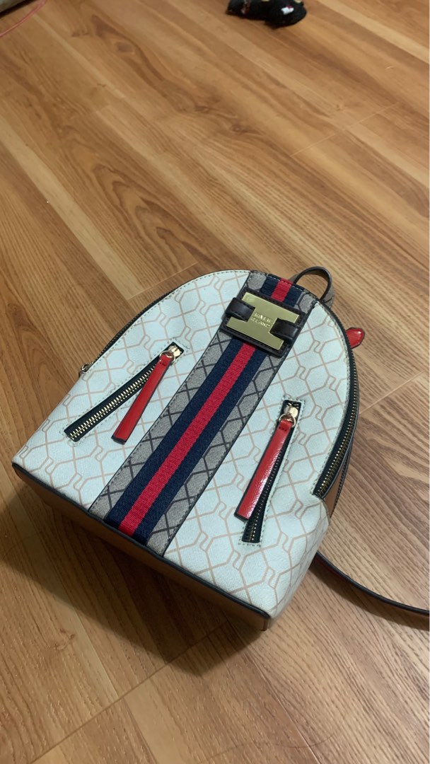 River island 2025 monogram backpack