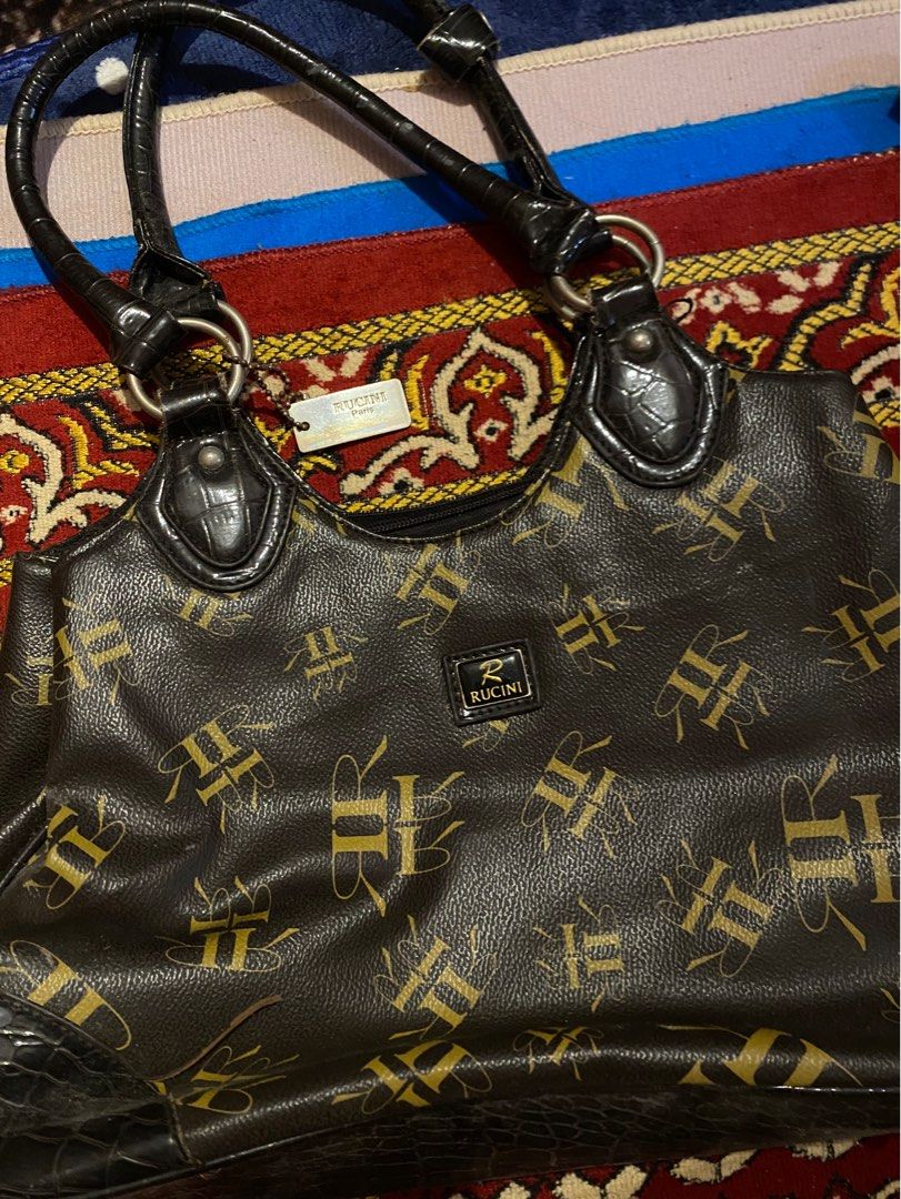 Rucini bag clearance