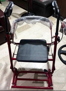 Walker Rollator with seat, footrest, and basket.