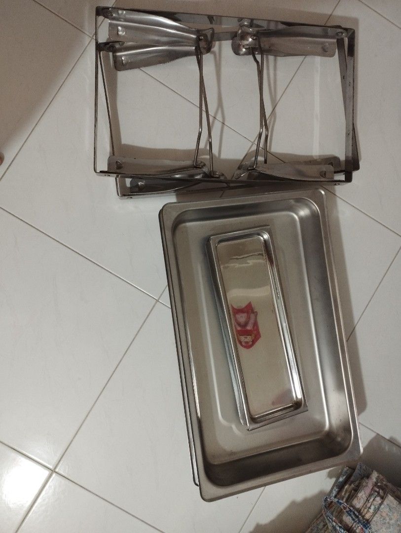 Buffet set (Category: Other Kitchenware & Tableware) located in Singapore. Submitted by overlord12b1 (Listing ID 1265076771, Image 3). Description: buffet set for 35 dollars (2 sets available) Extra inventory top have no handle stove or candle holder thin and deep bottom.