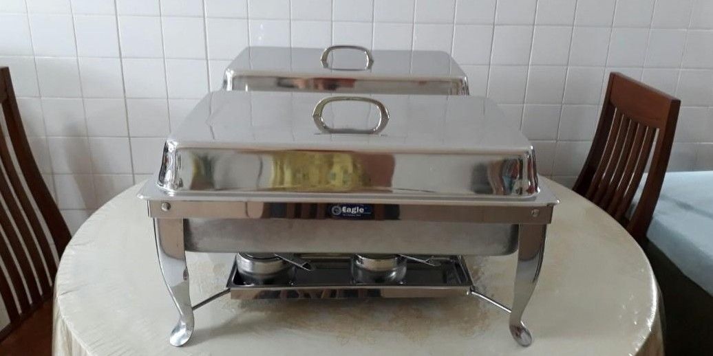 Buffet set (Category: Other Kitchenware & Tableware) located in Singapore. Submitted by overlord12b1 (Listing ID 1265076771, Image 2). Description: buffet set for 35 dollars (2 sets available) Extra inventory top have no handle stove or candle holder thin and deep bottom.