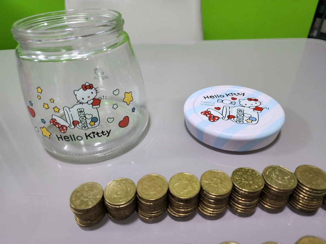 Coins 2nd series versions Singapore $1 ( Free hello kitty container ...