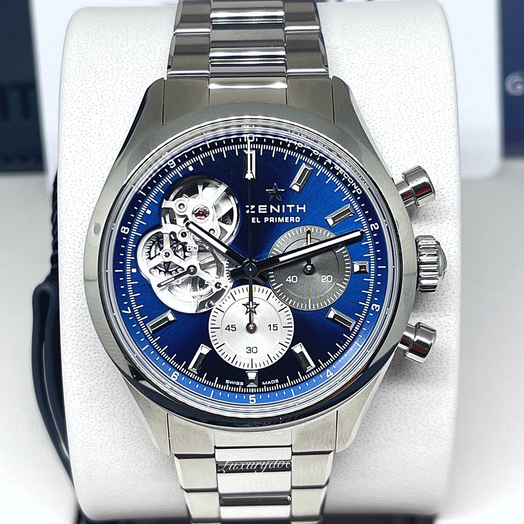 fs.bnib ZENITH EL PRIMERO AUTOMATIC CHRONOGRAPH CHRONOMASTER OPEN BOUTIQUE BLUE DIAL ON BRACELET 39.5MM WATCH 03.3300.3604/51.M3300 (Category: Watches) located in Singapore. Submitted by luxurydoc (Listing ID 1265016235, Image 3). Description: FS.BNIB ZENITH EL PRIMERO AUTOMATIC CHRONOGRAPH CHRONOMASTER OPEN BOUTIQUE BLUE DIAL ON BRACELET 39.5MM WATCH 03.3300.3604/51.M3300 Retail Price: $14,600 Technical Specifications MOVEMENT MOVEMENT El Primer