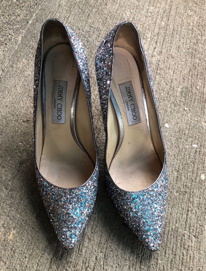 Jimmy Choo Romy 85 Glitter Pumps (Category: Sneakers & Footwear) located in Manila. Submitted by everythingsale101 (Listing ID 1265128508, Image 1). Description: Jimmy Choo Authentic Romy 85 Glitter Pumps Size 40 With sole protector No inclusions Needs cleaning lang, ganda pa nito; well used; manage expectations; normal signs of usage; detailed photos posted.