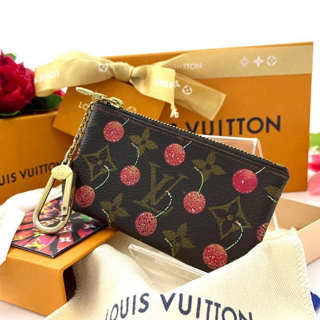 Louis Vuitton Multicolor Takashi Murakami Pochette, Luxury, Bags & Wallets  on Carousell