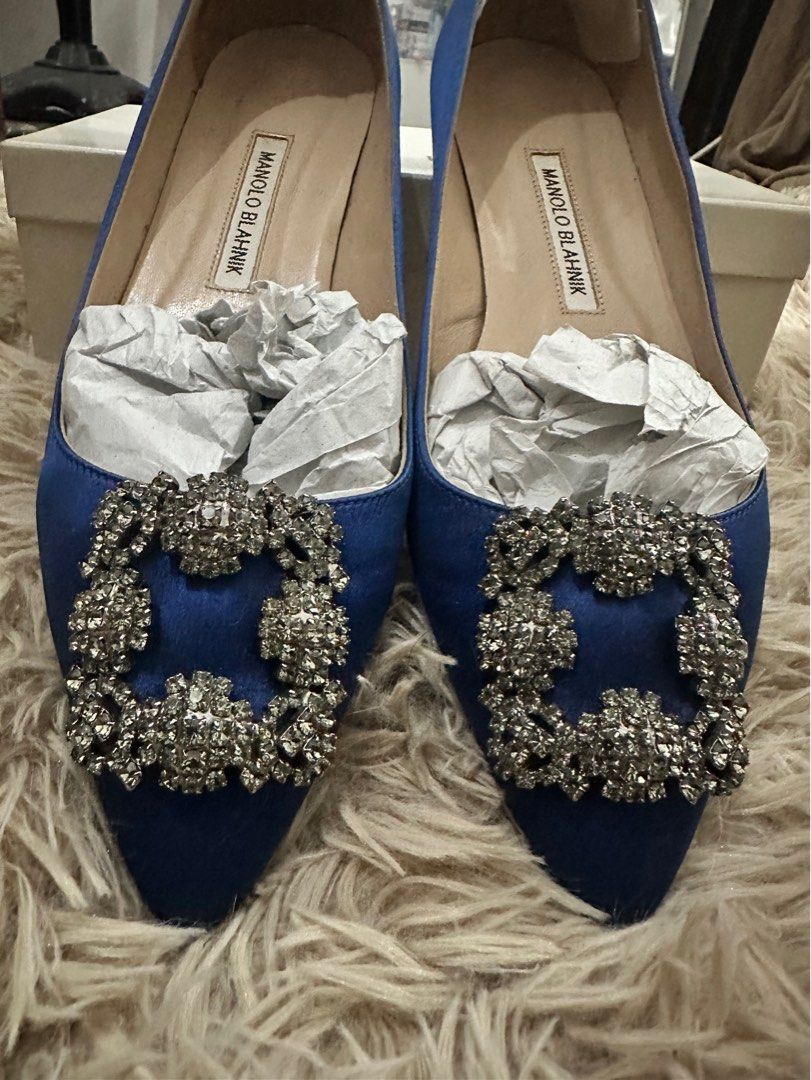 Manolo Blahnik Hangisi Blue Flats 38 (Category: Sneakers & Footwear) located in Manila. Submitted by everythingsale101 (Listing ID 1265120909, Image 1). Description: Manolo Blahnik Hangisi Crystal Buckle Flats Color: Cobalt blue (Carrie Bradshaw) Authentic Personal fave Hard to find color Flats Size 38 With box and shoebags For Manolo collectors 9/10 condition Detailed pics posted SALE.