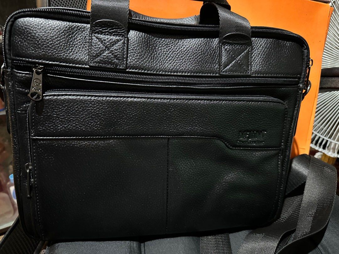 MC Jim Leather Sling Bag (Category: Sling Bags) located in Quezon City. Submitted by tkmarl (Listing ID 1265132930, Image 3). Description: Original Mc Jim sling bag for Laptop or office ✅Genuine leather ✅new ✅ can used for office purposes 💯 rfs: so many bags already MOP: Gcash or bank transfer MOD: Lalamove or Grab .