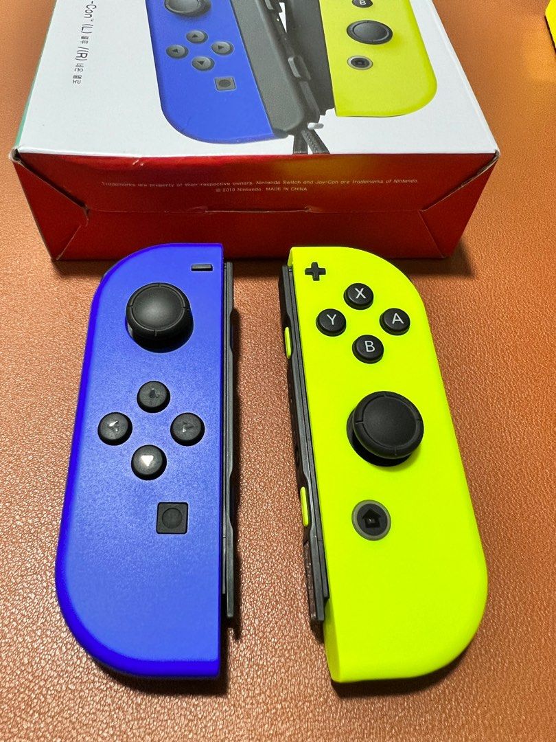 Blue and yellow joycons top