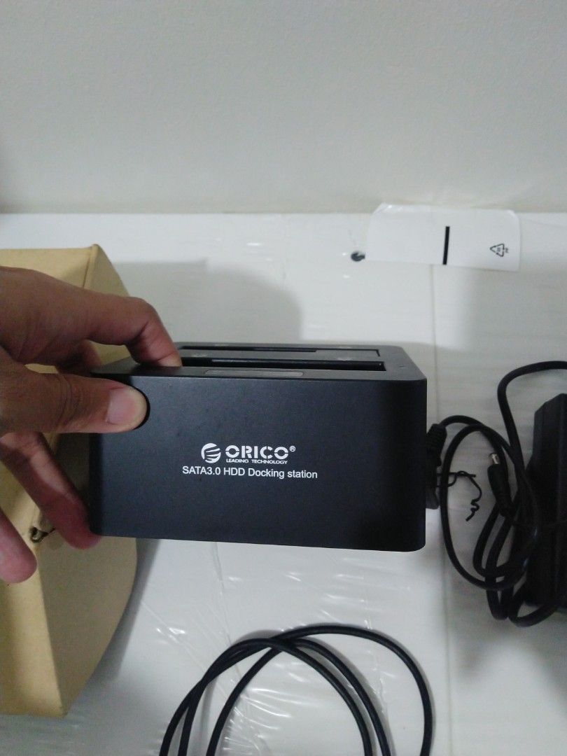Orico dual bay hard drive dock (Category: Other Accessories) located in Pasay City. Submitted by tmac2lebron (Listing ID 1265120267, Image 3). Description: sata 2.5 and 3.5 HDD dock good for old HDD with movies the OG of apple TV and Chromecast.