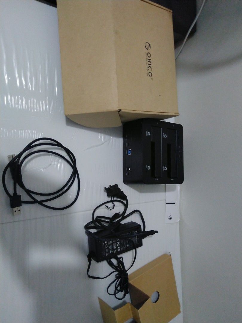 Orico dual bay hard drive dock (Category: Other Accessories) located in Pasay City. Submitted by tmac2lebron (Listing ID 1265120267, Image 1). Description: sata 2.5 and 3.5 HDD dock good for old HDD with movies the OG of apple TV and Chromecast.