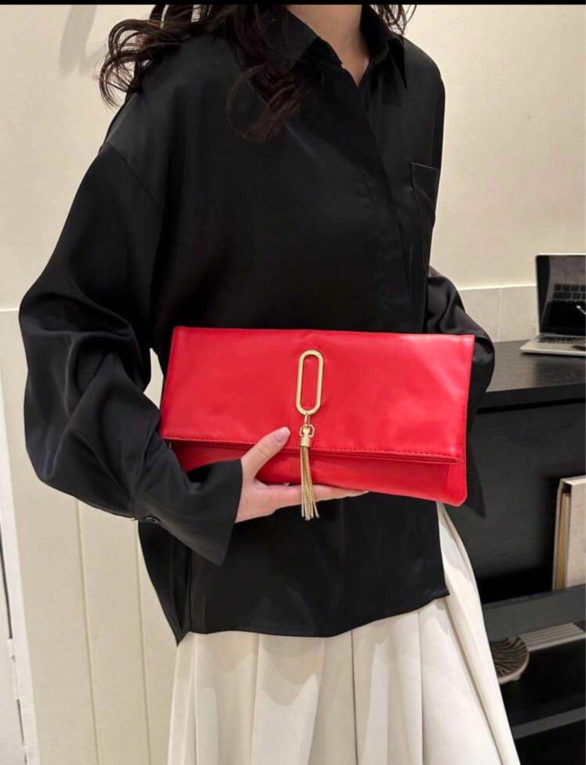 Red clutch bag with strap on sale
