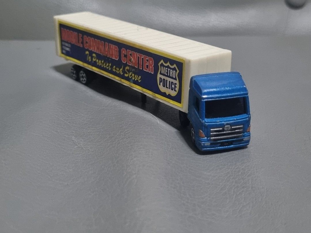 Tomica Hino Profia w/ trailer mobile command center (Category: Vehicle & Diecast Models) located in Silang. Submitted by samflores2k4t7 (Listing ID 1265118752, Image 1). Description: for sale Tomica Hino Profia no. 77 w/ trailer mobile command center (plastic) 2004 Tomy played condition with paintchip & scratches repaired trailer connector (replaced w/ screw).