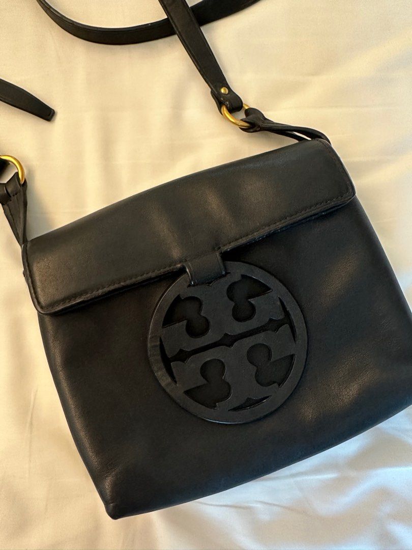 Tory Burch Miller Sling Leather (Category: Luxury Bags & Wallets) located in Angeles City. Submitted by bagpriceinfiniteluck (Listing ID 1265139648, Image 1). Description: Very mint condition, lost tassle but that does not affect the condition of the bag, black .