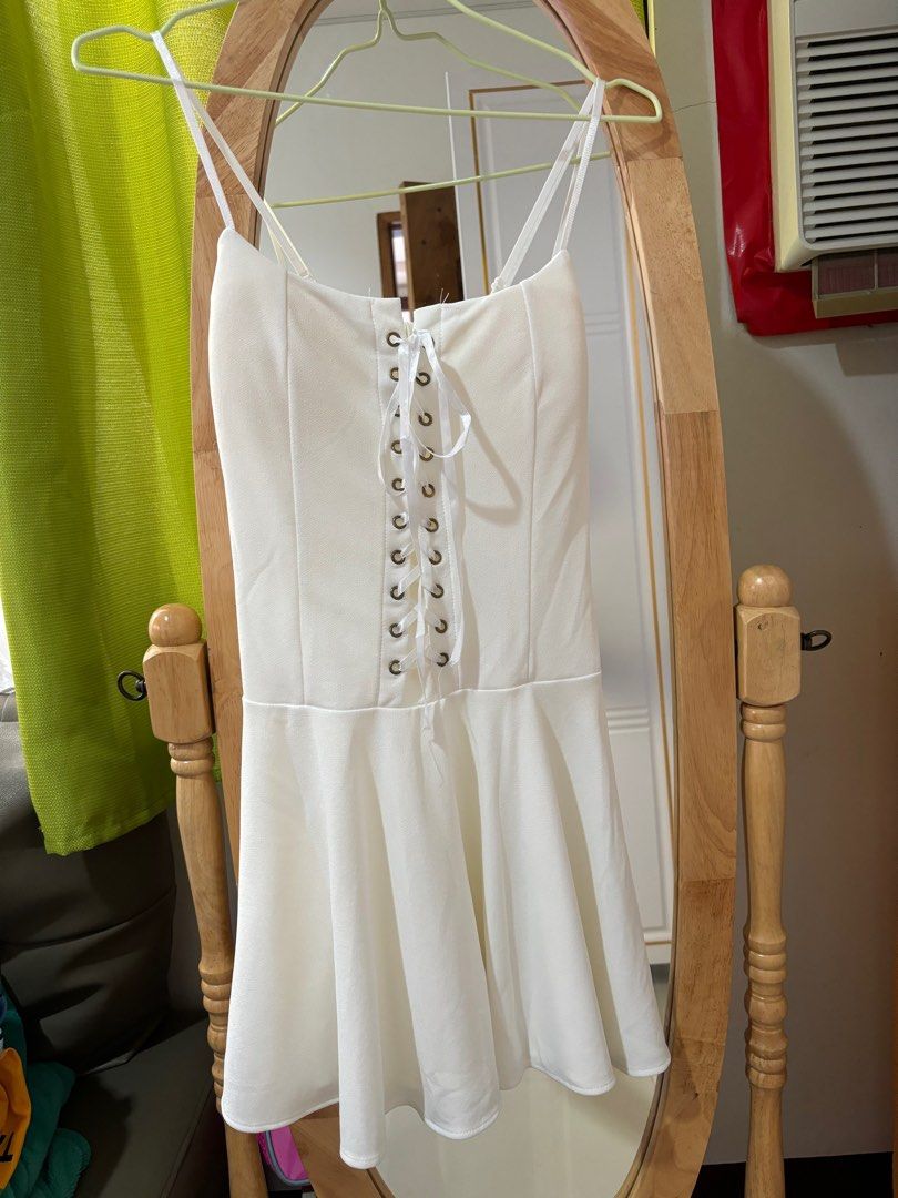 White dress (Category: Dresses) located in Clarin. Submitted by declutter_station101 (Listing ID 1265026661, Image 1). Description: Can fit from small to medium frame.