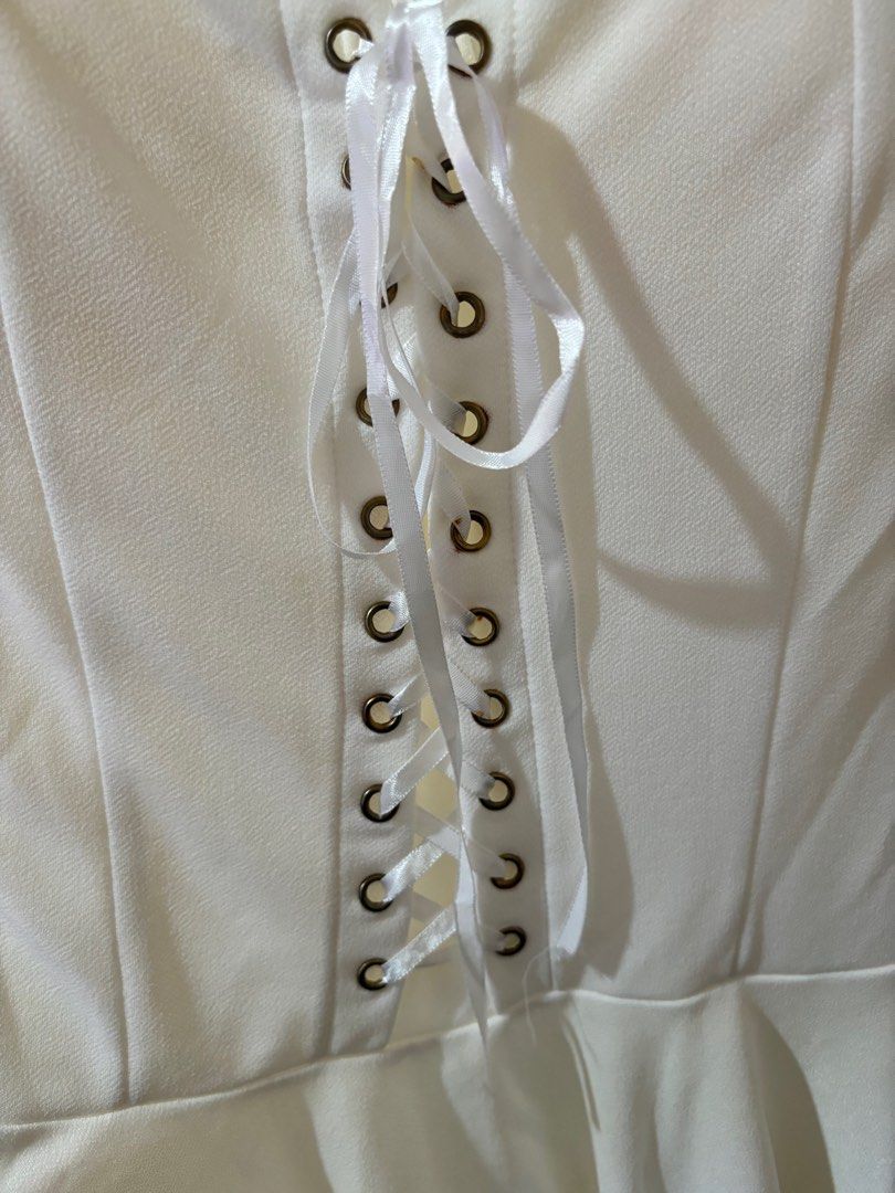 White dress (Category: Dresses) located in Clarin. Submitted by declutter_station101 (Listing ID 1265026661, Image 2). Description: Can fit from small to medium frame.