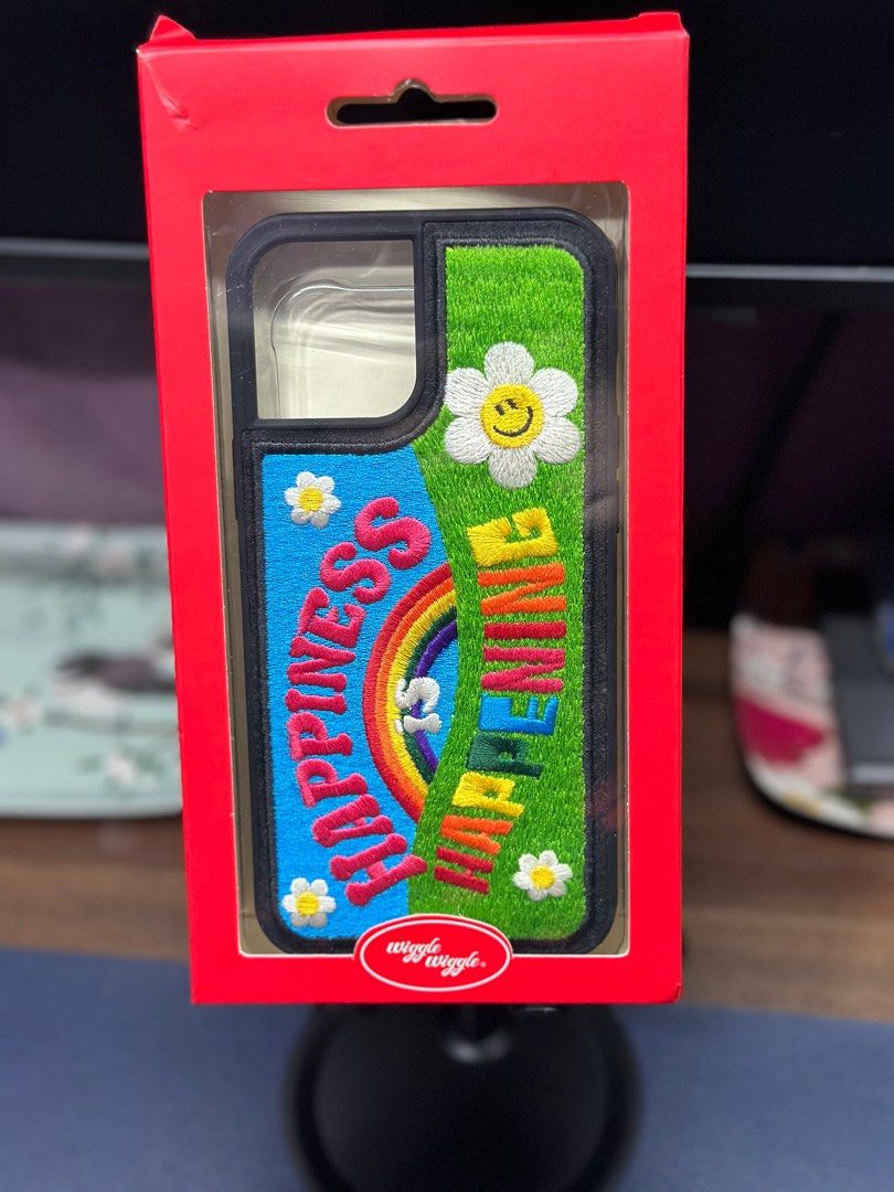 Wiggle Wiggle Happiness Embroidery Case for iPhone 12 Pro Max (Category: Cases & Sleeves) located in Quezon City. Submitted by bipolar_bear (Listing ID 1264965359, Image 2). Description: Buyer to shoulder shipping fees. Pick up via Grab or Lalamove..