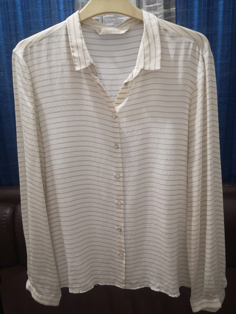 Zara silk long sleeves (Category: Longsleeves) located in Quezon City. Submitted by hellobuyeverything (Listing ID 1264985797, Image 2). Description: 🌻Like new 🌻Very flattery when worn 🌻 fits Med ro Semi large.