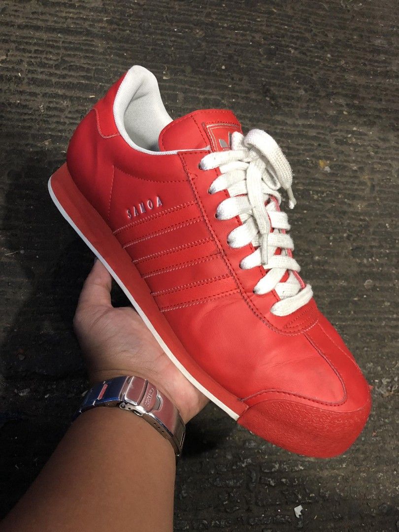Red adidas samoa on sale