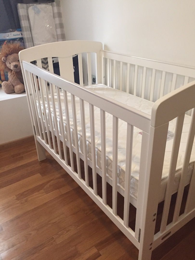 Cot with removable side hot sale