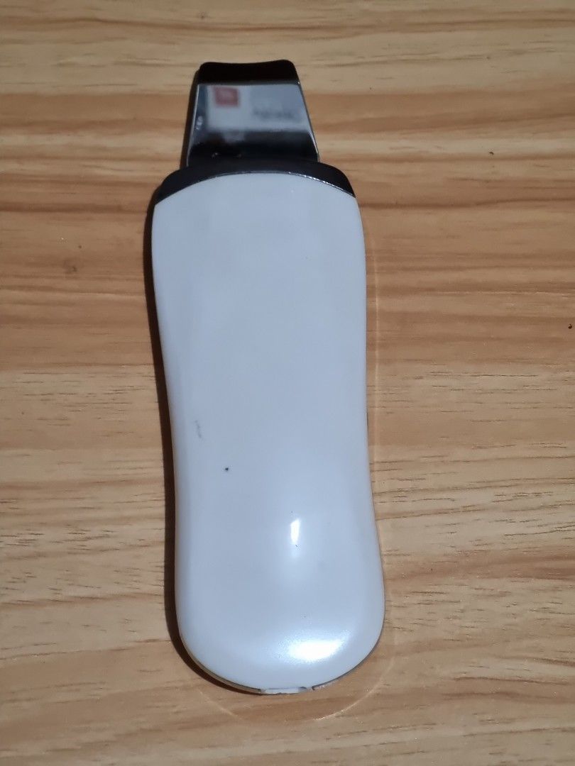 White Ultrasonic Deep Face Cleaning Machine (Category: Face Care) located in Paombong. Submitted by sweetdeals0181656 (Listing ID 1265265259, Image 2). Description: Rechargeable Ultrasound Facial Skin Scrubber/deep face cleaning machine. Brand Bellababy Tested Okay. Unit only USB Charger, Cover and adaptor not included..