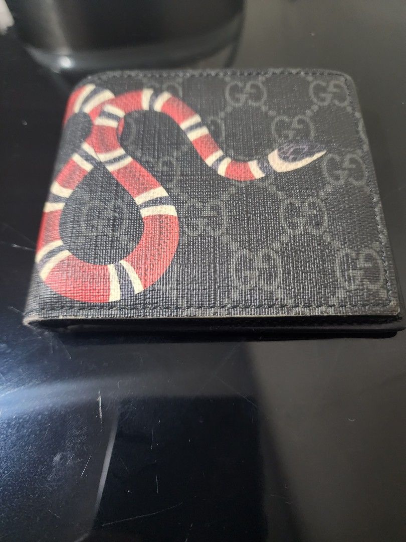 Gucci snake wallet sales real vs fake