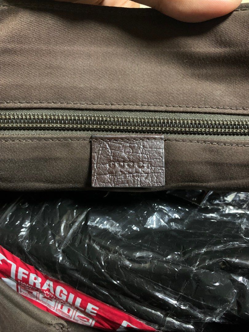 Gucci messenger bag fake vs real hot sale
