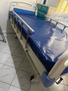Hospital Bed 3 Cranks 95% new with leather mattress