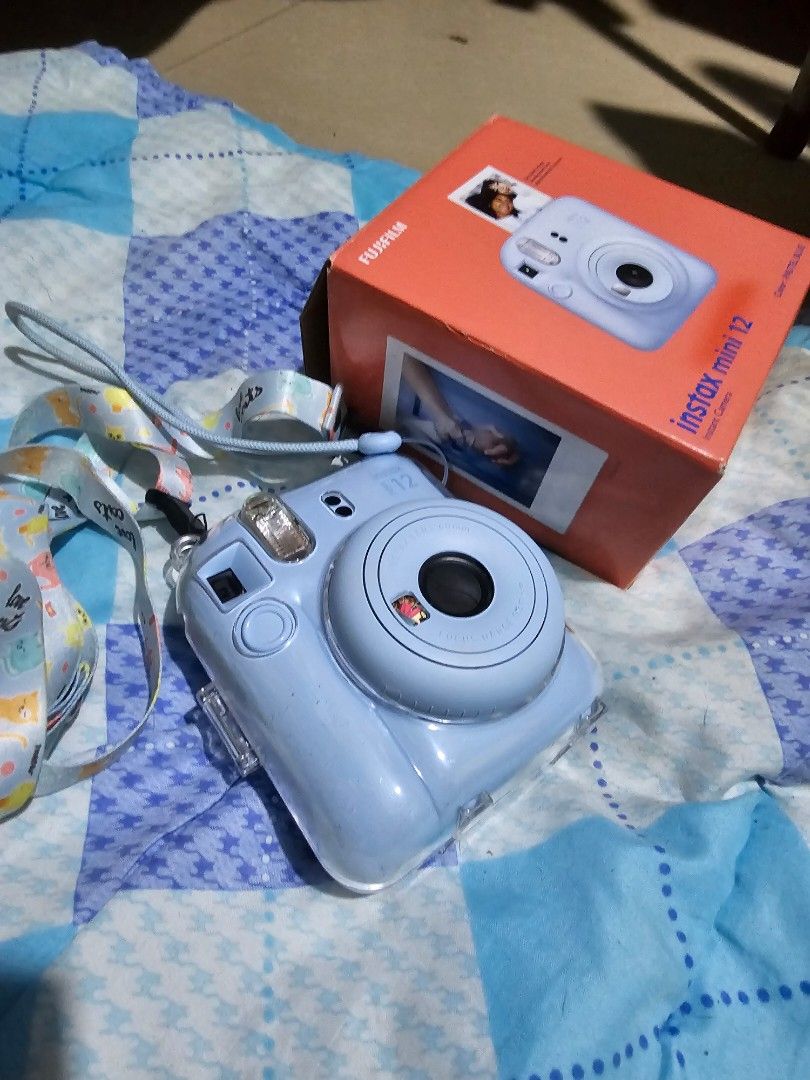 Instax Mini 12 pastel blue, Photography, Cameras on Carousell