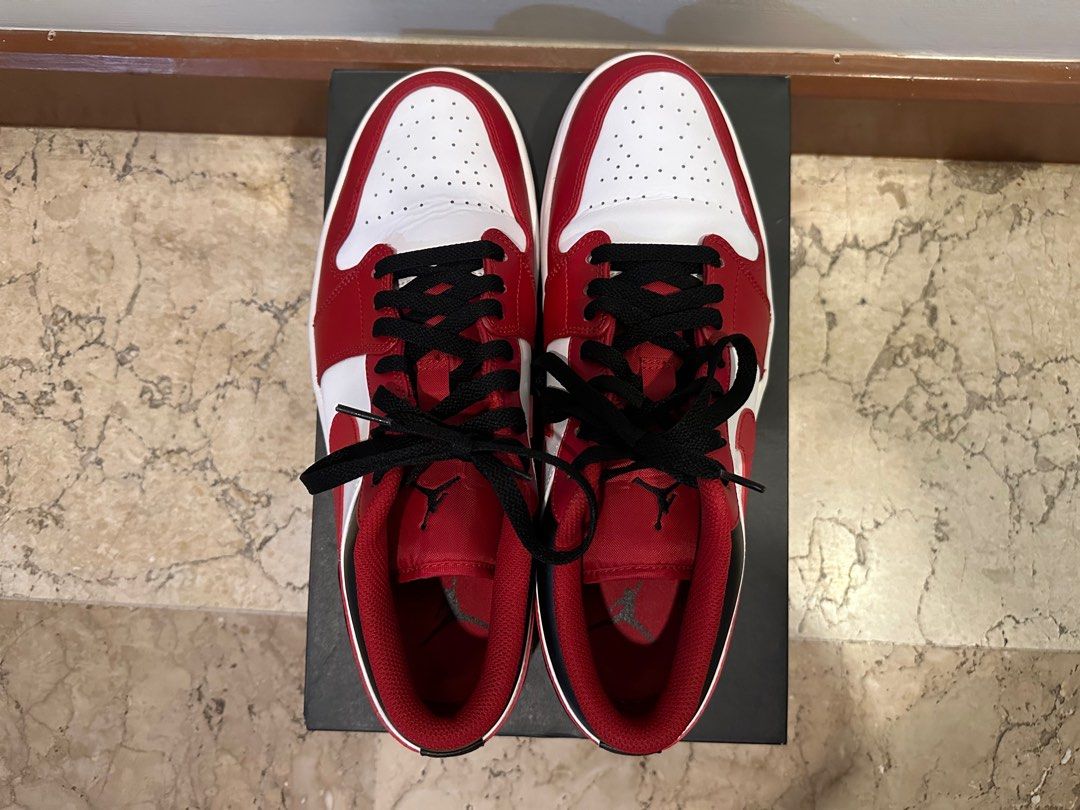 Jordan 1 Low Bulls/Reverse Black Toe US 12 (Category: Sneakers) located in Manila. Submitted by cjdrubio (Listing ID 1265328649, Image 3). Description: Jordan 1 Low Bulls/Reverse Black Toe US 12 Bought online locally. Legit pair. Used, around 8.5/10 Honest issues: Some faded stars, heel drags. Creasing on toe box. Some minor scuffs professionally retouched. Complete with original box, cardboard shoe inserts. .