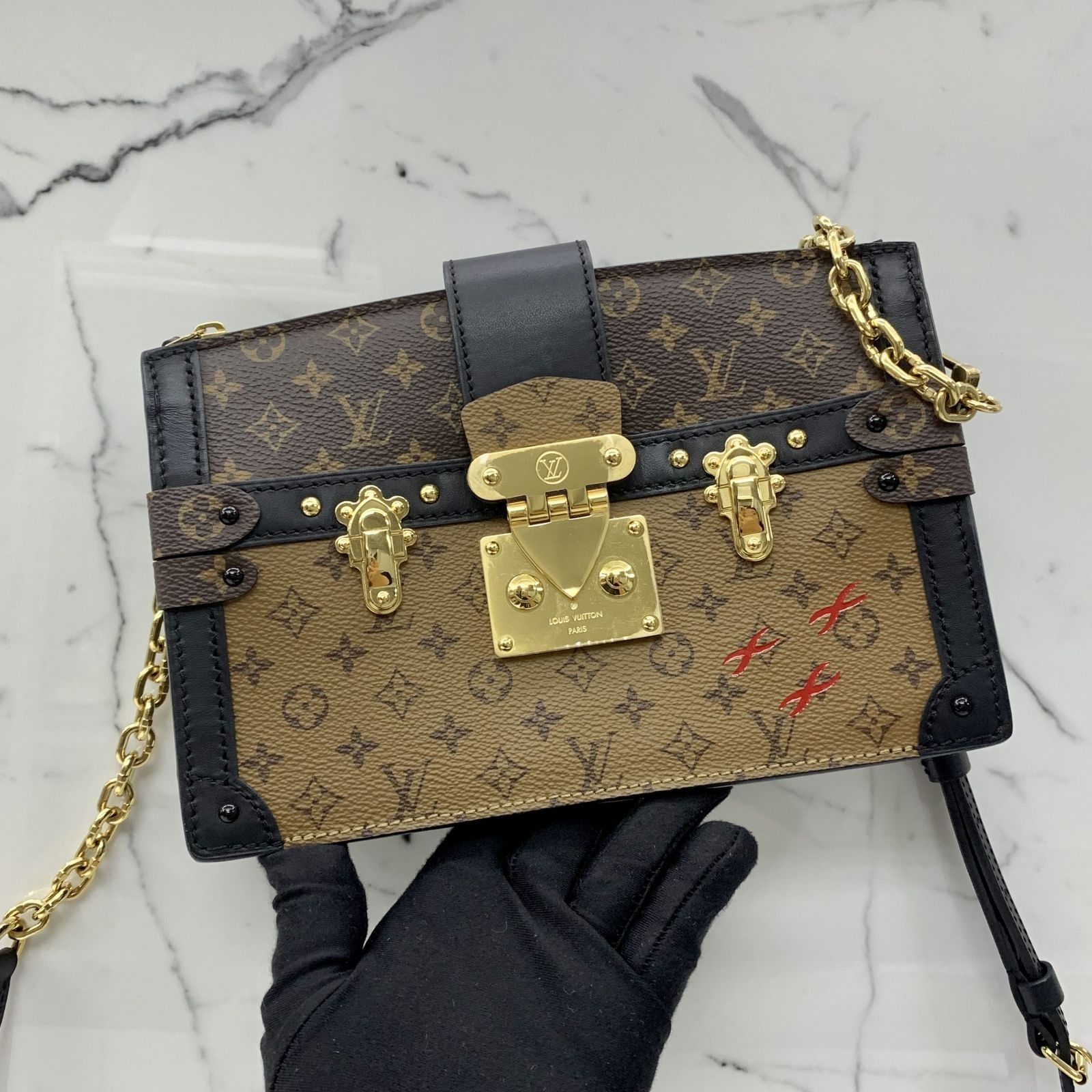 LV TRUNK CLUTCH REVERSE MONOGRAM, Luxury, Bags & Wallets on Carousell