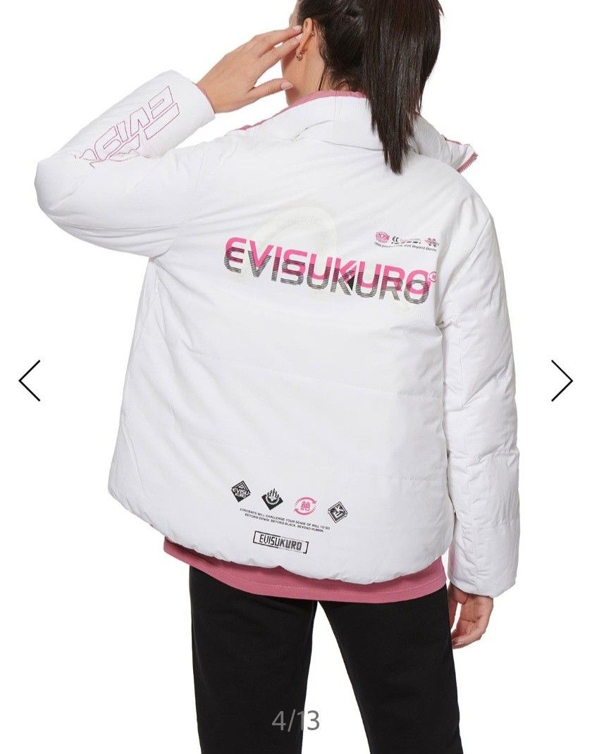 Winter Jacket (Category: Coats, Jackets and Outerwear) located in Singapore. Submitted by mus66 (Listing ID 1265327489, Image 8). Description: Distinctly different on the inside and outside, this reversible down jacket gives you a pristine and clean-lined appearance on one side, and a feminine and sporty look on the other, granting you double styling options. : 100% Polyamide . Loose fit . Logo and X-shaped arrow embroideries . Logo and warning s