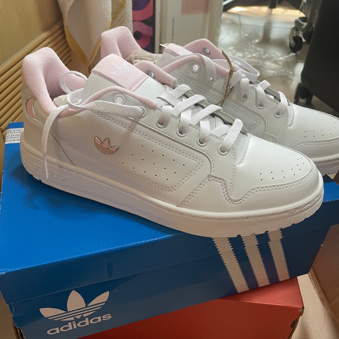 White trainers with birds on best sale