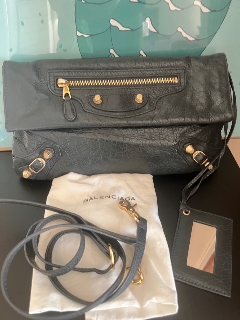 Balenciaga clutch with strap top