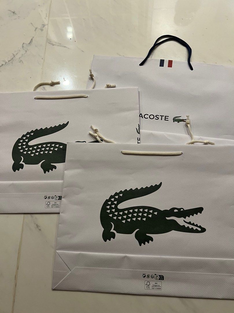 Authentic Lacost paperbags (Category: Luxury Bags & Wallets) located in Quezon City. Submitted by outlet18 (Listing ID 1265347121, Image 2). Description: 5 pcs available price is per piece.